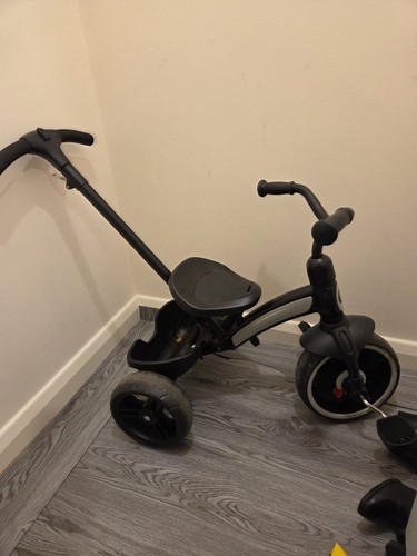 Tricycle with push handle